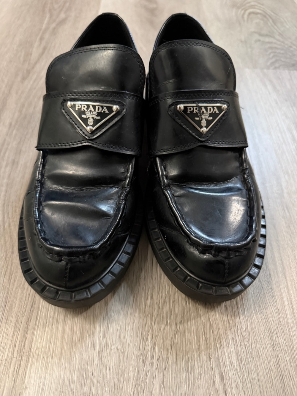 Prada Black Leather Penny Loafers with Metal Triangle Logo - Picture 16 of 16